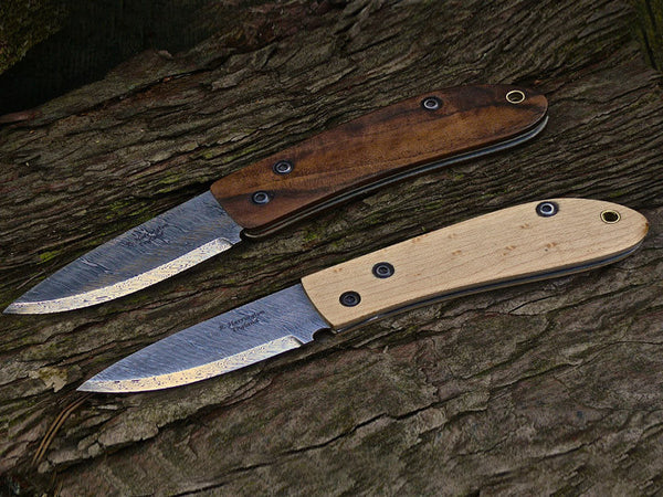 Damasteel Friction Folders with Walnut and Maple Scales