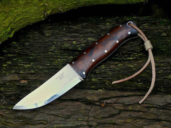 Hunter RWL34 and Desert Ironwood Scales over Black Fibre Liners. Stainless fittings.