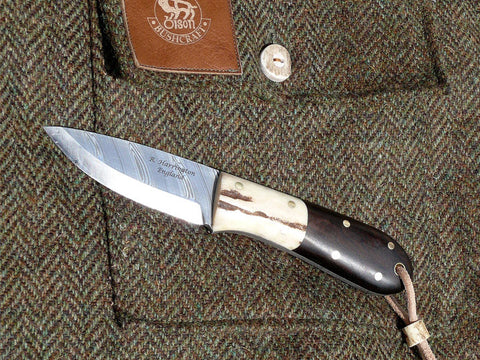 Bushmans Pal with Twist Pattern Damasteel Blade, Walnut Scales and Antler Bolsters
